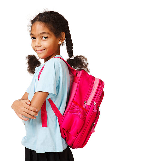 A Young African American Schoolgirl With Her Arms Crossed Stock Photo -  Download Image Now - Istock